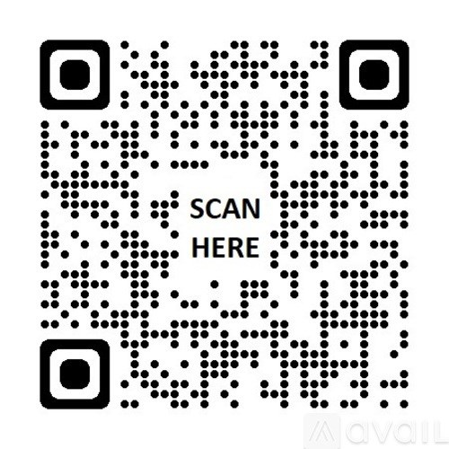 A QR code is displayed on a white background with the word "SCAN HERE" written below it.