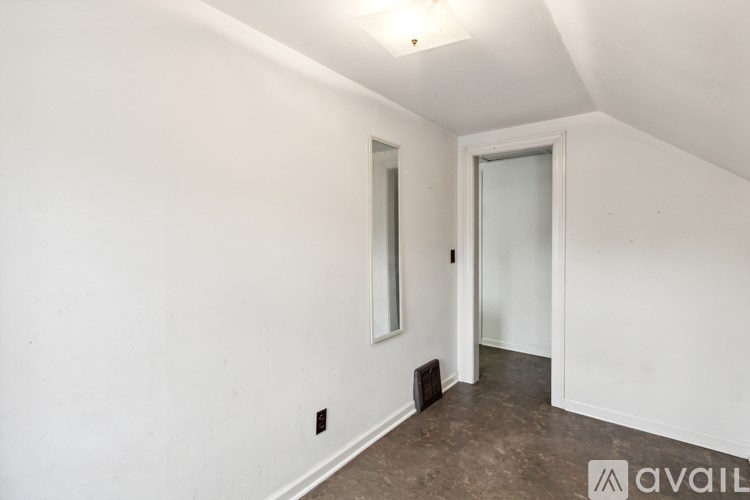 A room with a door and a window.