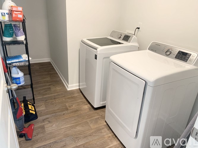A laundry room with a washer and dryer.