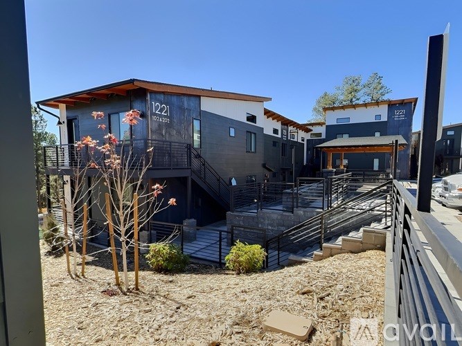 A modern house with the number 122 on it.