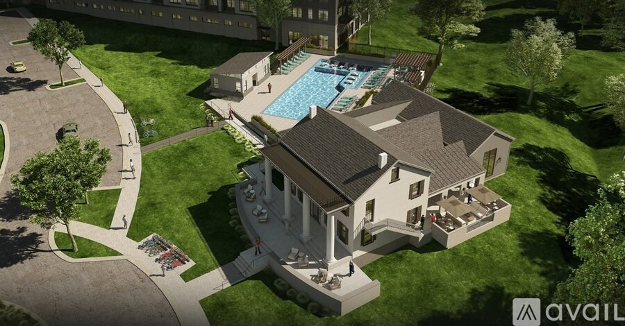 A large house with a pool in the backyard.