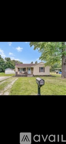 A house with a mailbox in front of it.