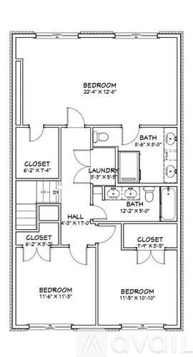 A floor plan of a two-bedroom apartment with a laundry room and two bathrooms.