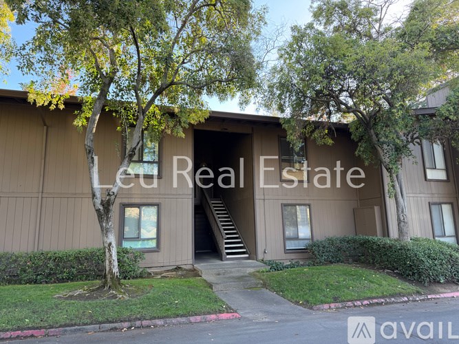 A building with the words "Real Estate" written on it.