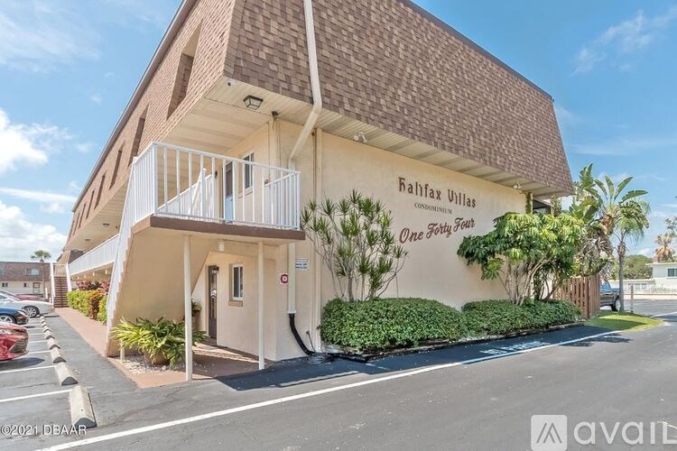 A building with the sign "Bahrain Ullman" is shown.