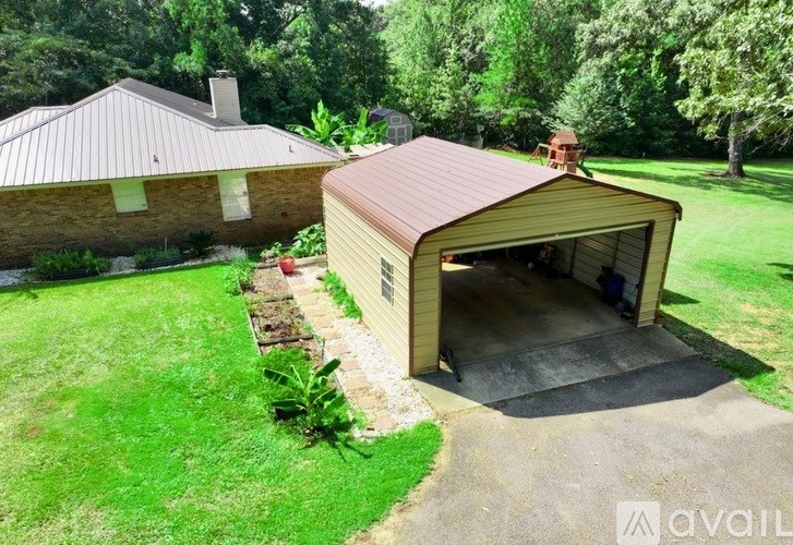 A house with a garage and a driveway.