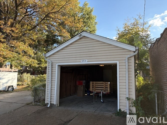 A garage with the number 9351 on it is available for rent.
