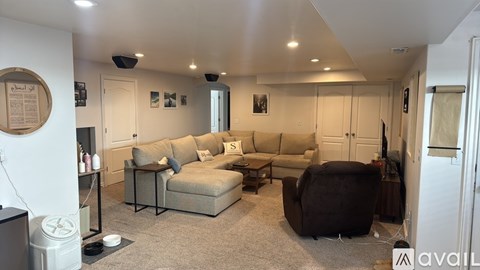 A living room with a sofa set and a coffee table.