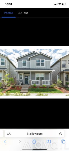 A 3D tour of a house is displayed on a mobile device.