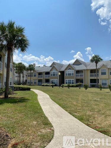 A building with a lawn in front of it.