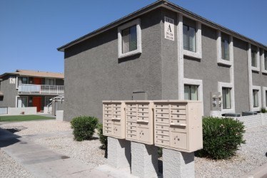 A building with a sign that reads "A" on the front.