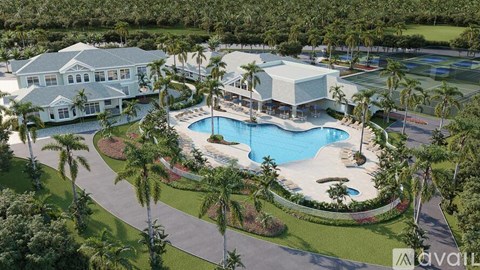 A golf course with a clubhouse in the background.