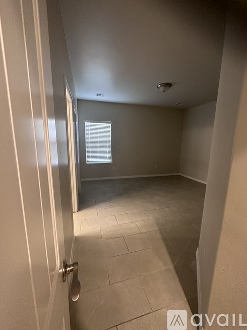 A room with a door and a window.