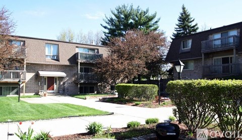 A residential area with houses and trees.