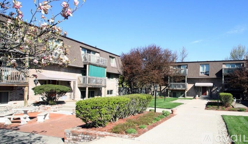 A residential area with houses and trees.