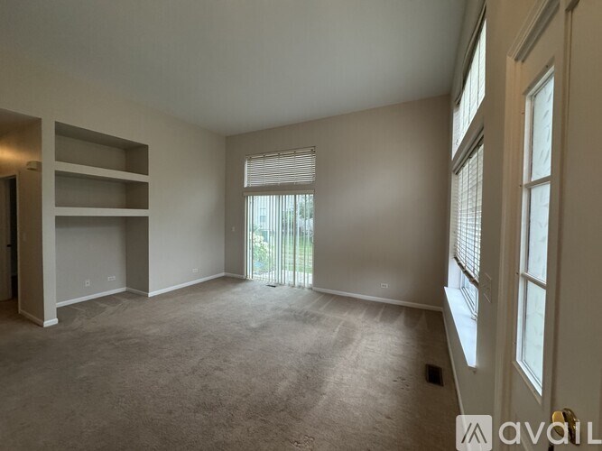A spacious room with a window and a bunk bed.