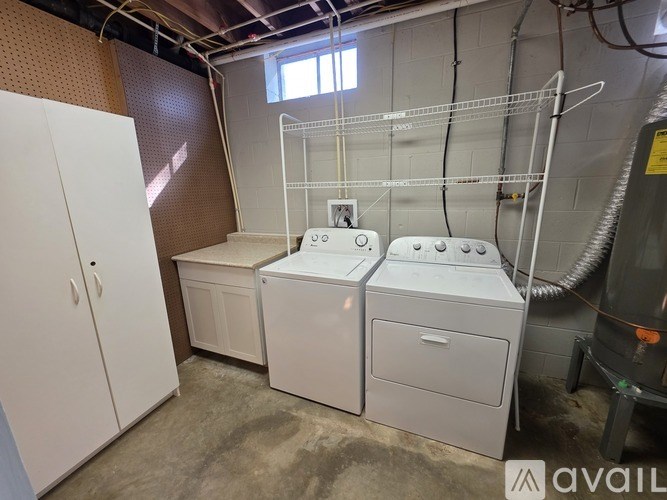 A laundry room with a washer and dryer.