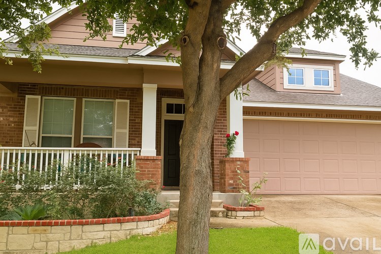 A house with a tree in front of it.