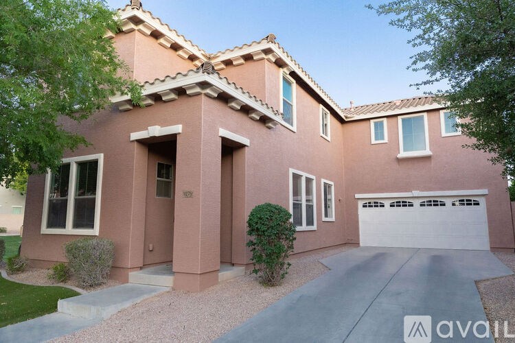 A house with a driveway and a garage.