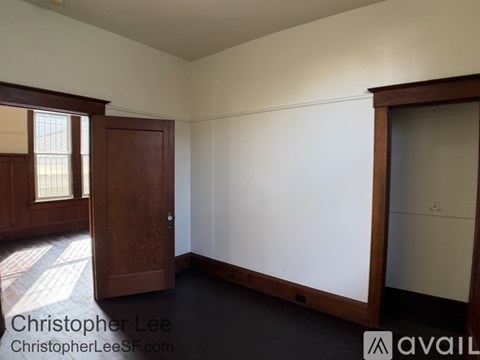 A room with a door and a window.