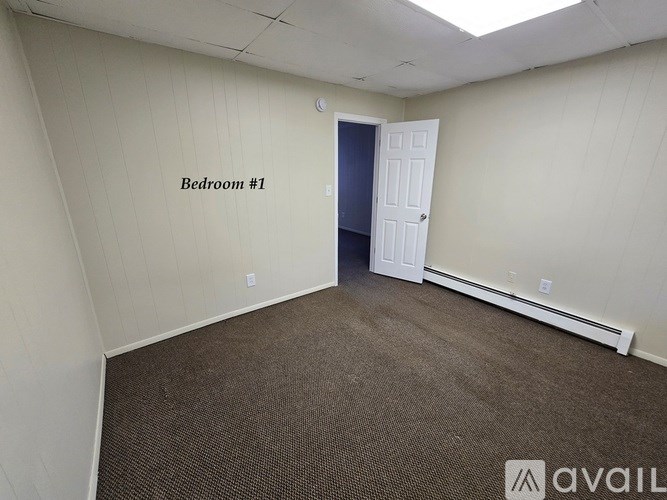 Bedroom 1 is empty and waiting to be furnished.