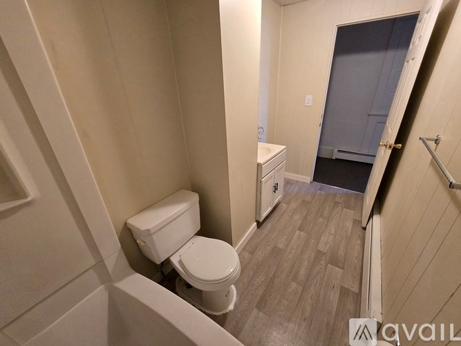 A small bathroom with a toilet and sink.