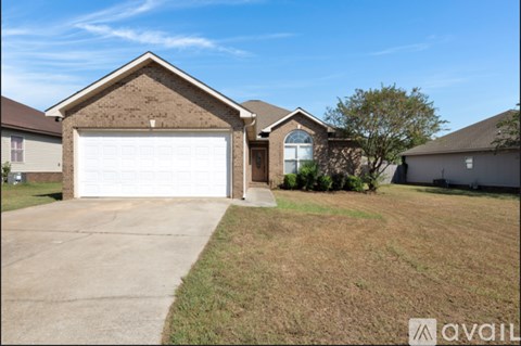 A house with a garage is for sale.