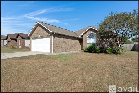 A house with a garage is for sale.