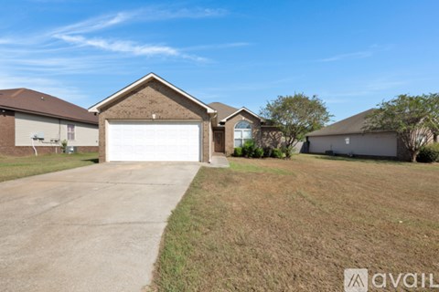 A house with a garage is available for sale.