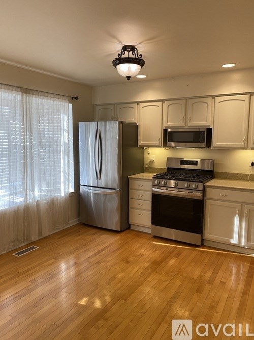 A bathroom with a sink and a mirror.