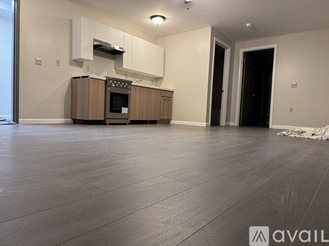A kitchen with a stove top oven and microwave above it.