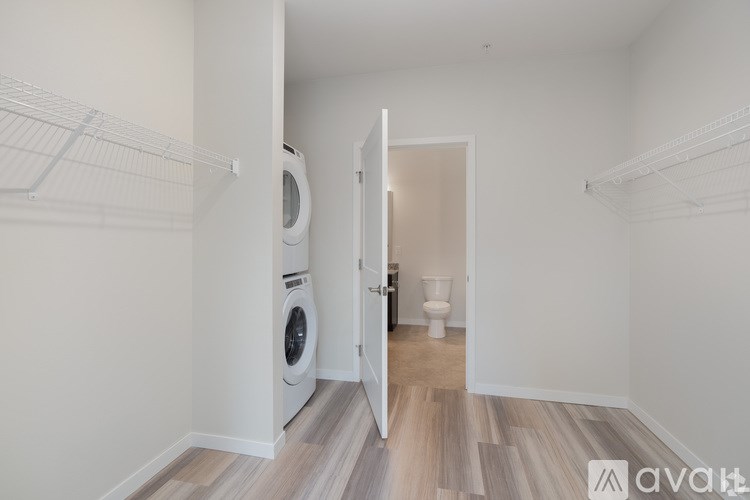 A laundry room with a washer and dryer.