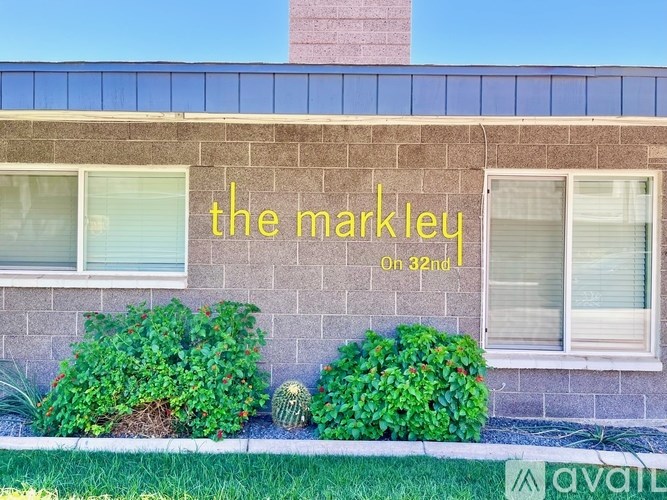 A building with a sign that says "The Markley" on it.