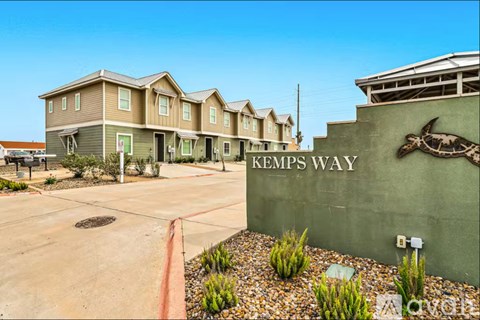 A building with the name "Kemps Way" on its wall.