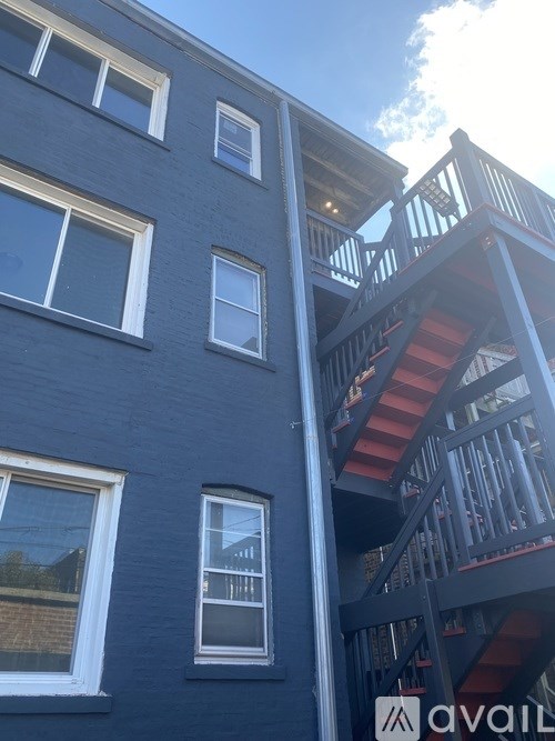 A building with a staircase attached to it.