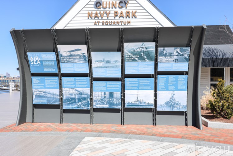 A sign for Quincy Navy Park at Squanto is displayed.