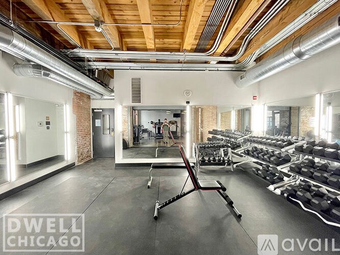 A gym with a variety of equipment is available for use.