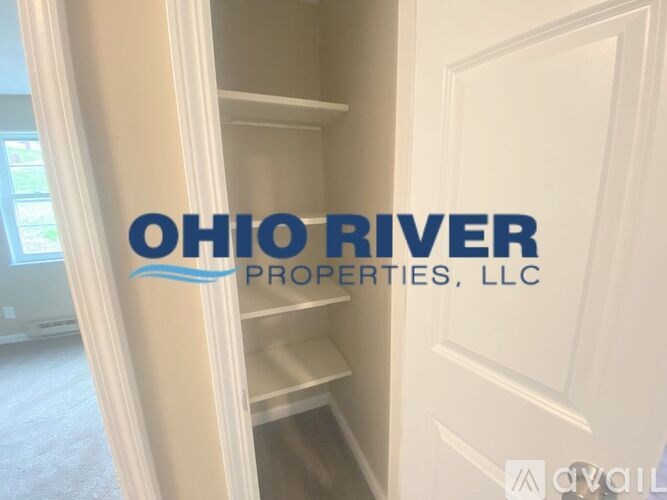 An open closet door with the words Ohio River Properties, LLC on it.