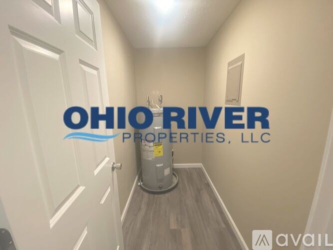 A hallway with a logo that says Ohio River Properties, LLC.