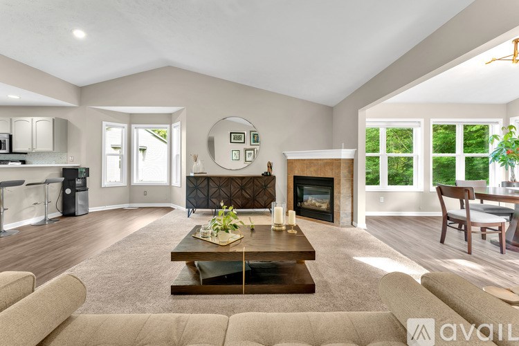 A living room with a fireplace and a couch.