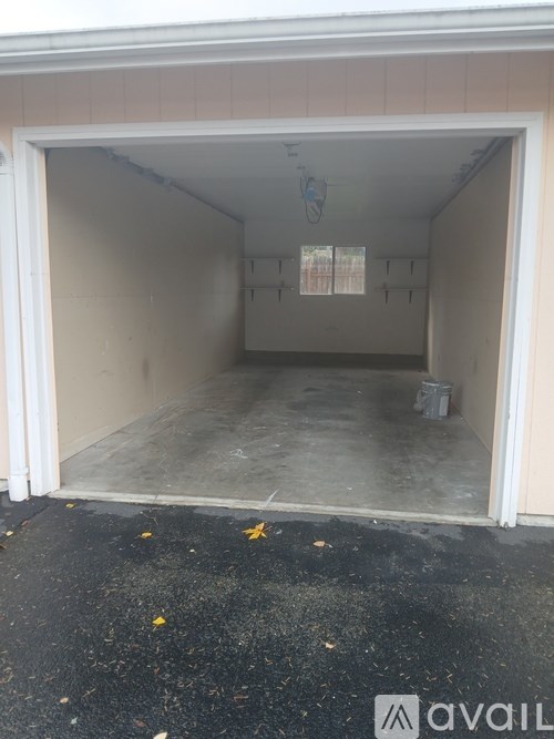 A garage with a white door is available for rent.