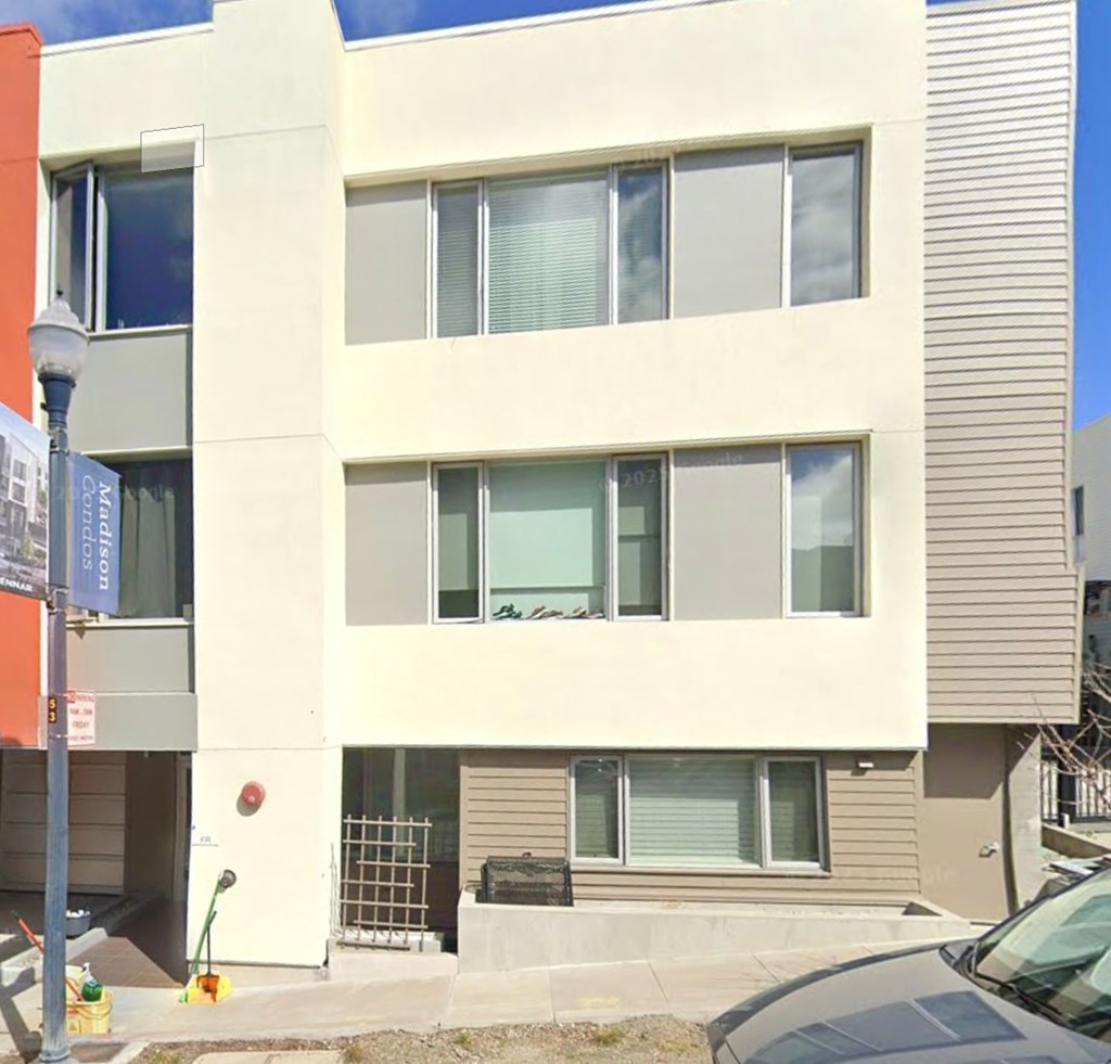 A building with a sign that says "Marsh Court" on it.