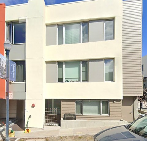 A building with a sign that says "Marsh Court" on it.