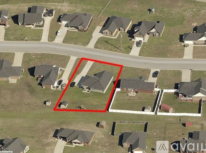 A red square is drawn on an aerial view of a neighborhood.