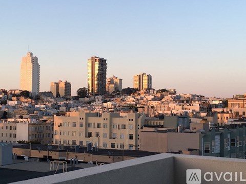 A cityscape with a mix of residential and commercial buildings.