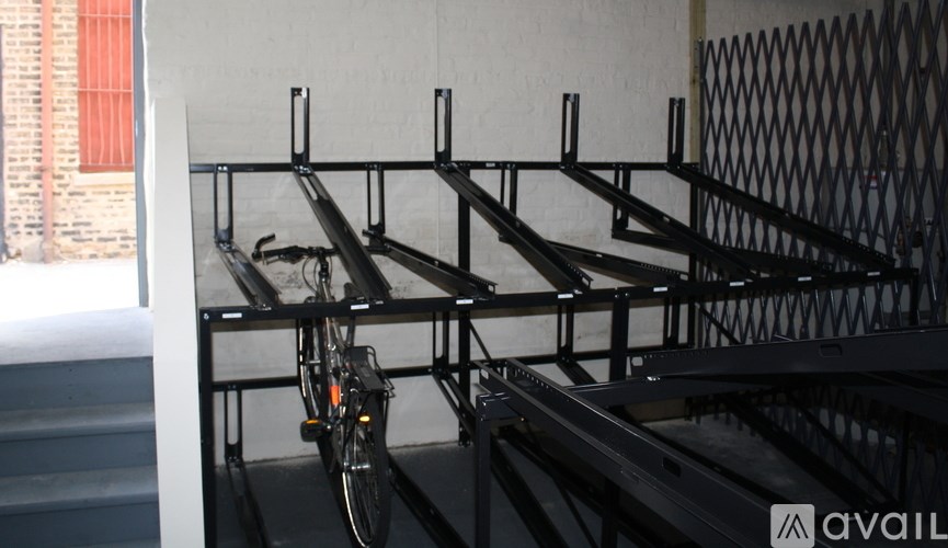 A bicycle is parked on a bike rack.