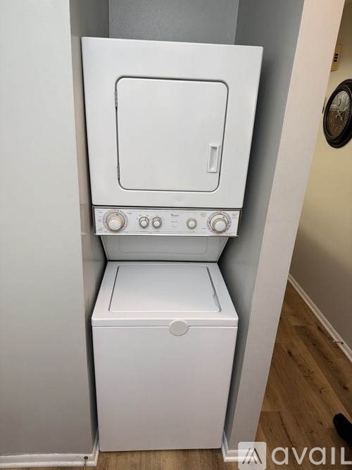 A white dishwasher is installed in a kitchen.