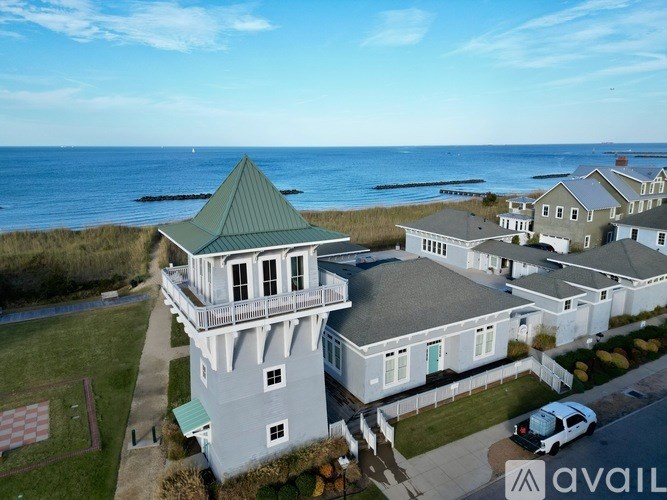 A house with a tower-like structure is available for rent.