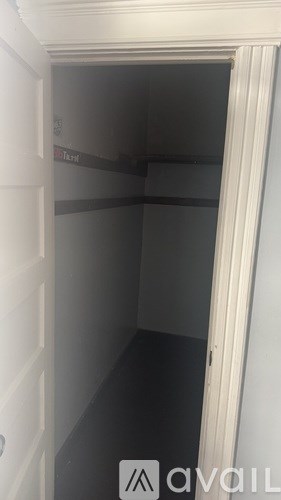 A white door with a sign that says "available" on the bottom right.