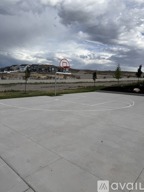 A basketball court with a no entry sign in the middle.